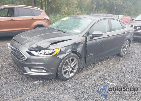 2017 Ford Fusion Hybrid Se z USA, uszkodzony, nr VIN 3FA6P0LUXHR286039